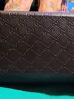 Gucci Black Embossed GG Leather Clutch